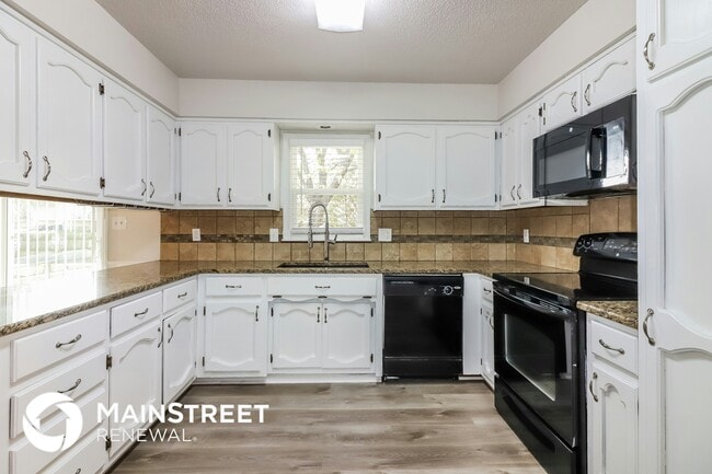 Photo - 210 N Huntsman Blvd