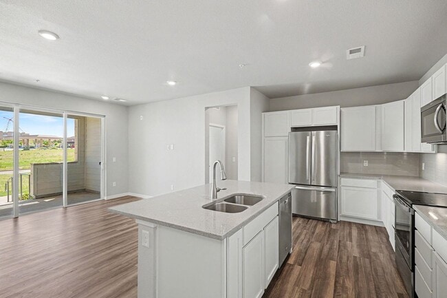 Building Photo - Updated 2 Bed / 2 Bath Corner Condo in Parker – Ground Level Convenience! Unit 108