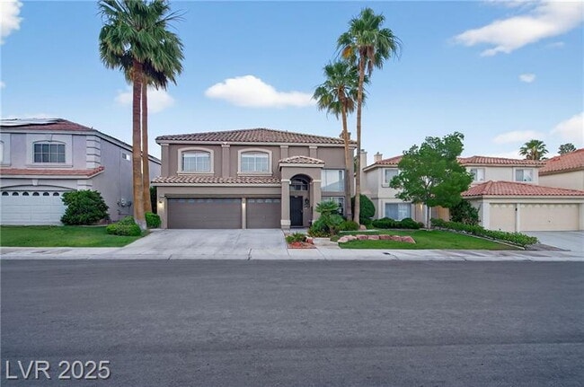 Photo - Exquisite 5-bed, 3-bath home w/ spacious 3-car garage offers luxurious living & effortless entert...