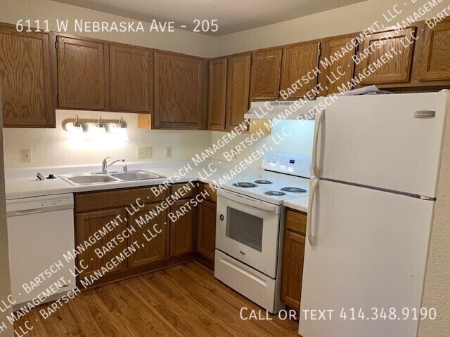 Building Photo - 6111 W Nebraska Ave Unit 205