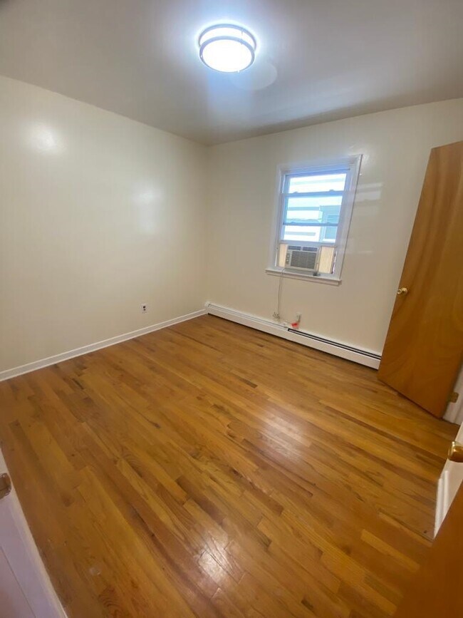 Photo - 185 W 51st St Unidad 1