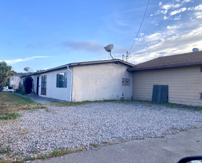 Entrance to the home parking for 2 cars off street included - 4460 Clairemont Mesa Blvd House