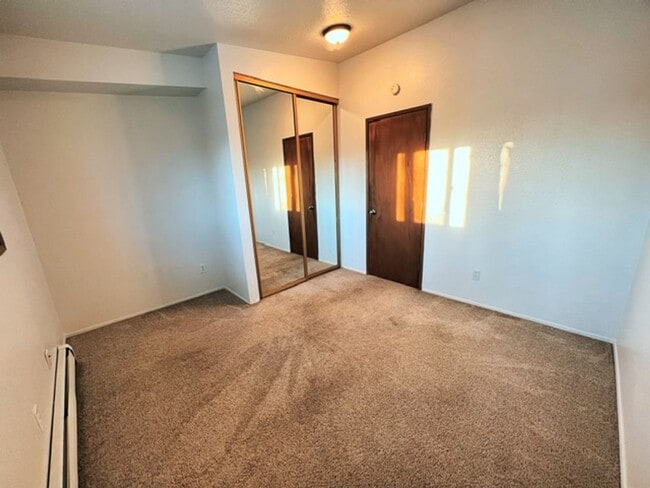 Photo - Spacious & Bright Top Floor Condo in East Anchorage, Close to Base + W/D In Unit!