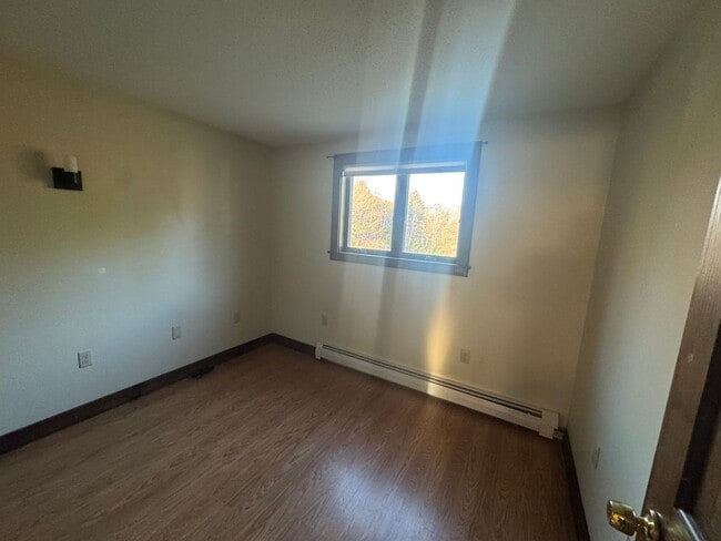 Photo - Cozy 2-Bedroom Second-Floor Home with Backyard & Deck