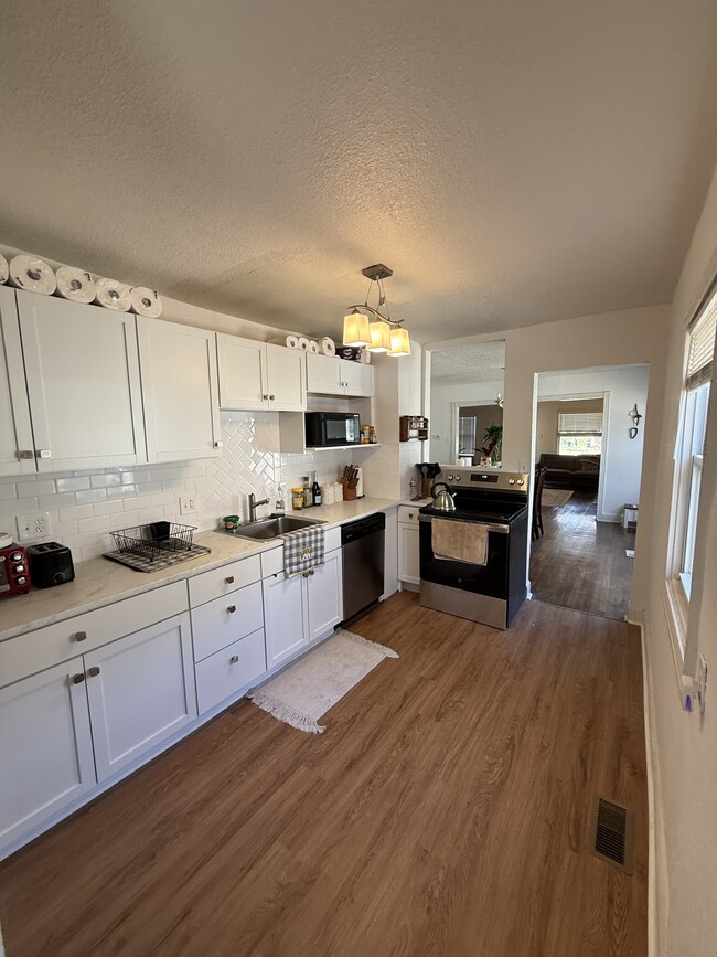 Building Photo - 5119 Paseo Blvd Unit 5119 Paseo Blvd