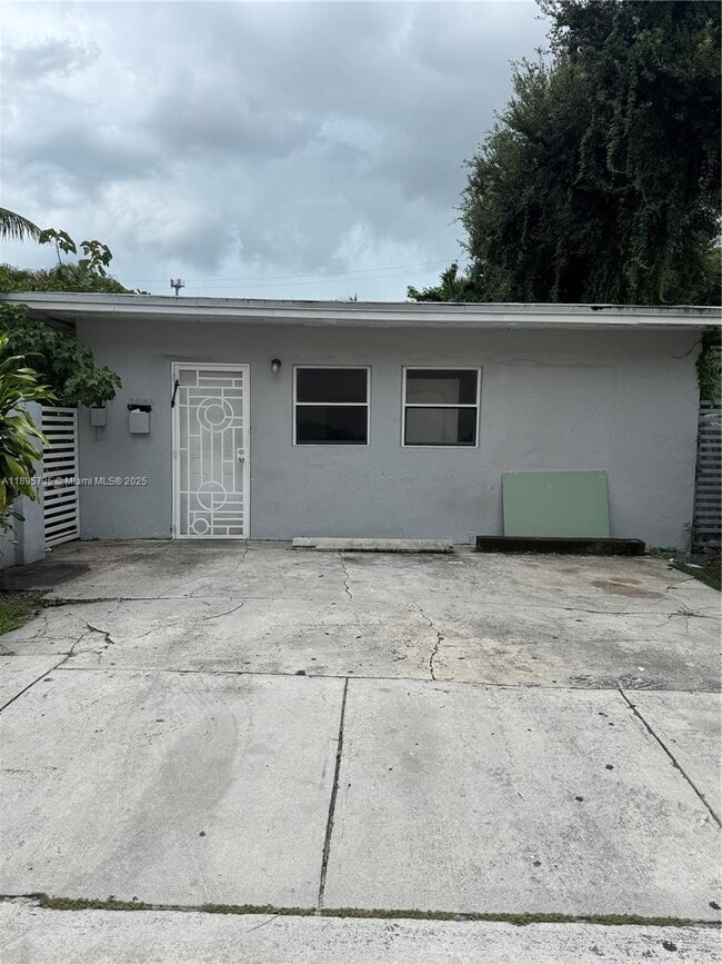 Building Photo - 7009 NW 5th Ave Unit 1