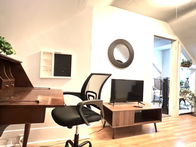 Desk and TV area - 613 Birch St
