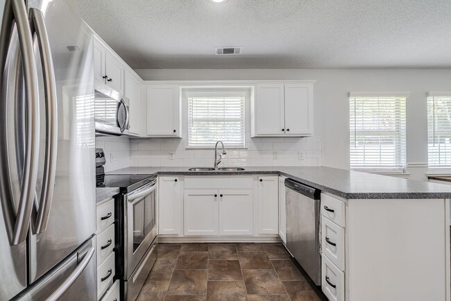 Photo - Updated 3BR Home with Fenced Yard in the H...