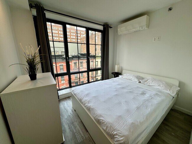 Photo - 433 W 53rd St Apartment Unit 73