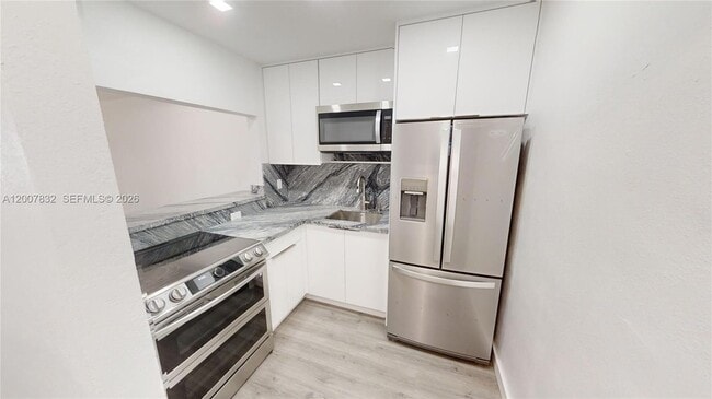 Building Photo - 1441 Lincoln Rd Unit 309