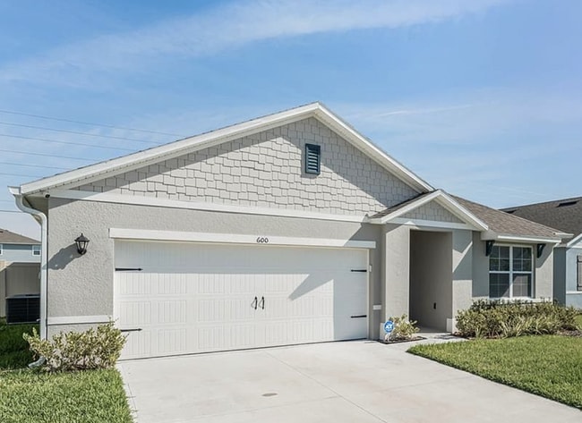 Building Photo - Three Bedroom, 2 Bathroom single family home with 2 Car Garage.