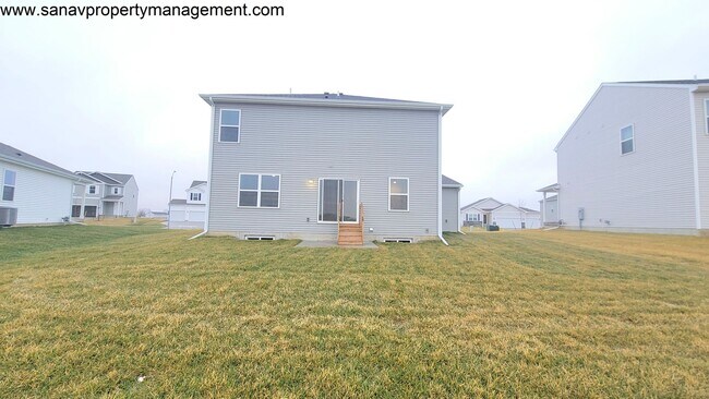 Photo - Turnkey Elegance: 4BR, 2.5BA Two-Story Haven with Gourmet Kitchen & Luxurious Master Suite!-3 CAR...