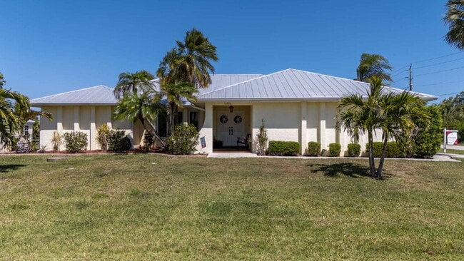Photo - "Spacious 3-Bed Sanctuary with 3.5 Baths in Charming Port Charlotte!"