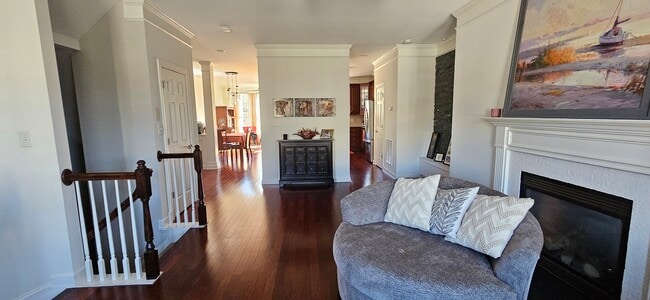 Partial view of dining area and kitchen from living room - 423 Panorama Park Pl