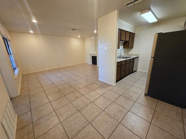 Photo - Charming 2 bedroom, 2  bath townhome in desirable area near a Golf Course & a greenspace. Two pat...