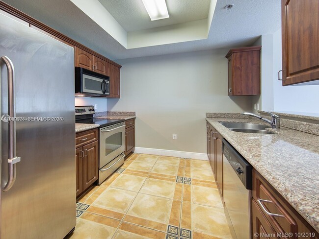 Building Photo - 3590 Coral Way Unit 509