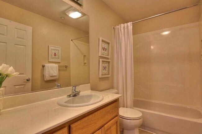 Photo - UPGRADED TOWNHOME IN RIVERMARK SOUGHT-AFTER WALK-UP SETTING