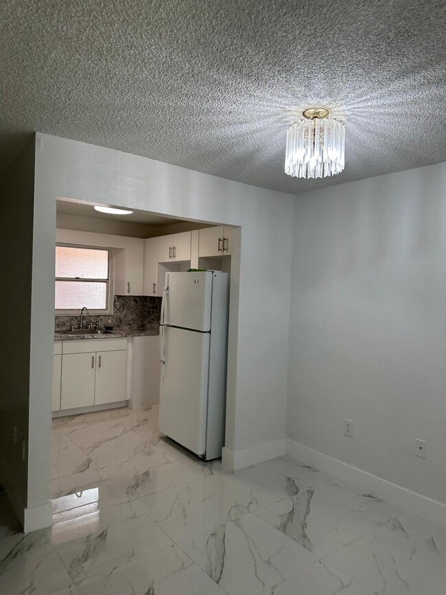 Photo - 1855 W 60th St Unit 204