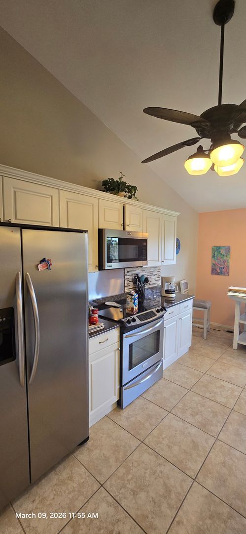 Photo - Welcome to **Caloosa Yacht & Racquet Club**, one of Fort Myers’ most desirable **gated waterfront...