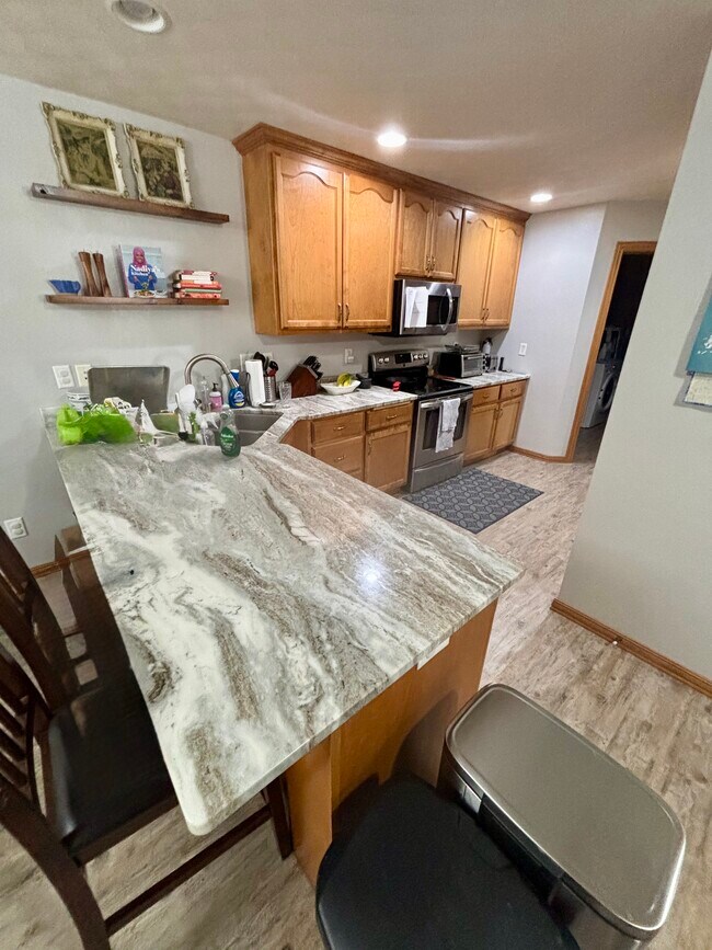 Kitchen with stainless steel appliances - N9689 Hopfensperger Rd