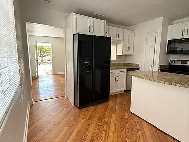 Photo - Charming Centrally Located Home | Wood Floors + Fenced Yard