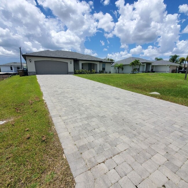 Building Photo - Coming Soon! 4 Bedroom 2 Bath Annual Rental in NW Cape!