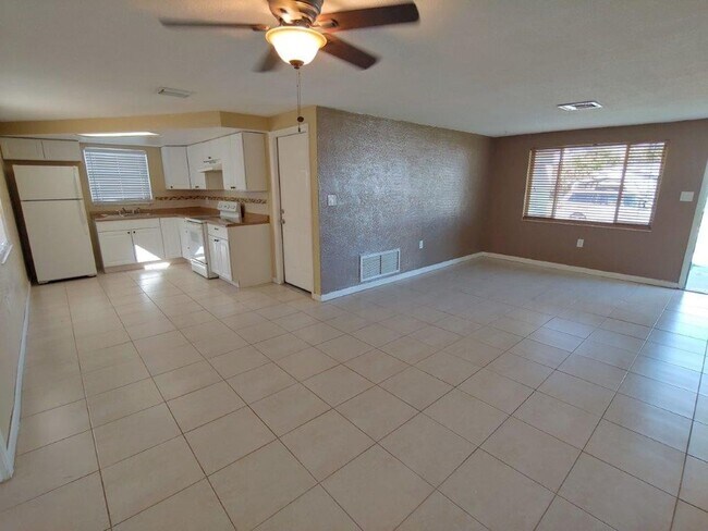 Photo - Gorgeous 3/2/1 1200 Sq. Ft. with fenced yard, all tile floors, custom baths and remodeled kitchen!!