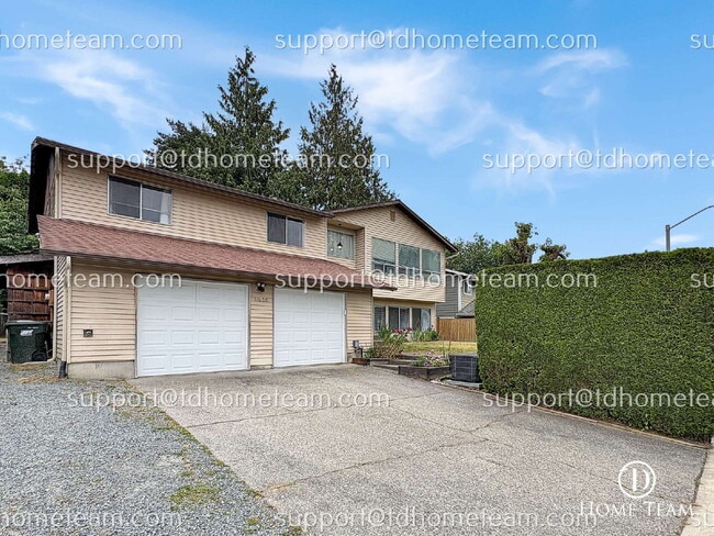 Building Photo - "Spacious 4-Bed Oasis with Granite Touches & Finished Basement in Renton!"