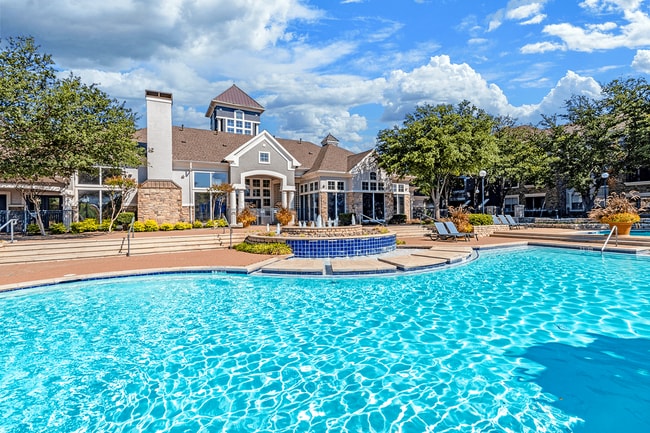 Embrace leisure at our tranquil pool - Grand Venetian at Las Colinas