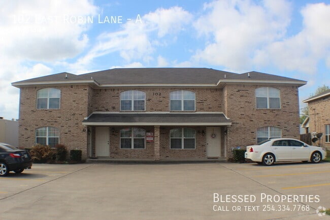Building Photo - 102 E Robin Ln Unit A Rental