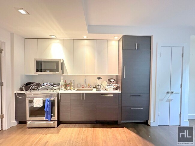Photo - 1 bedroom 1 bathroom KING SIZE with washer and dryer. Unit 3AB