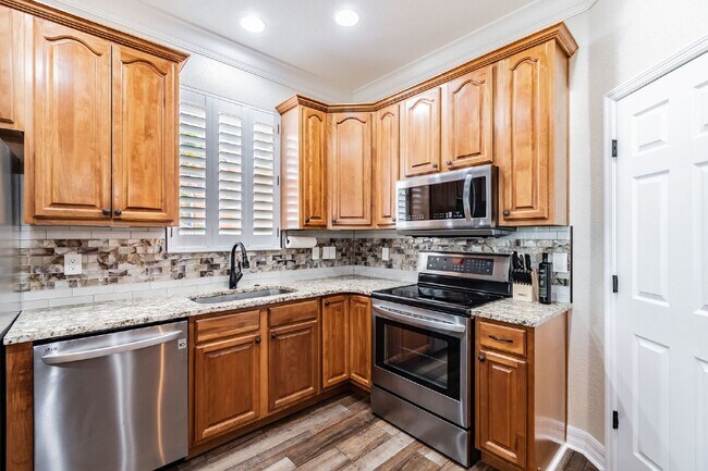 Photo - FURNISHED WATERFRONT 4 BED 3 BATH POOL HOM...