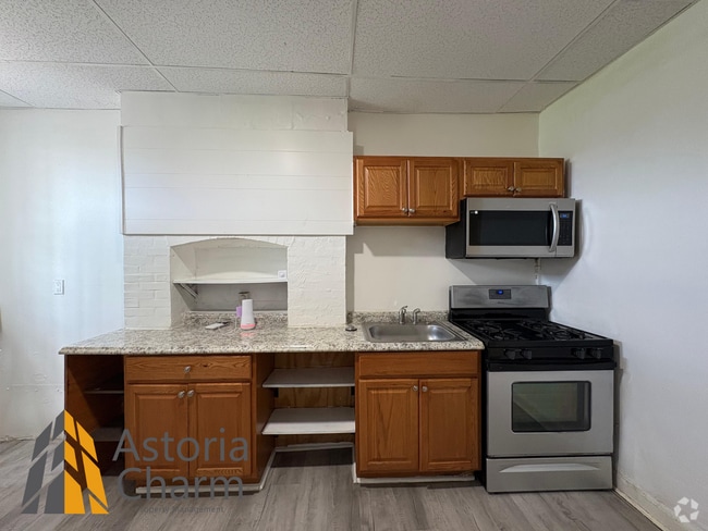 Building Photo - Updated 4 BR Home with Spacious Yard & Pre...