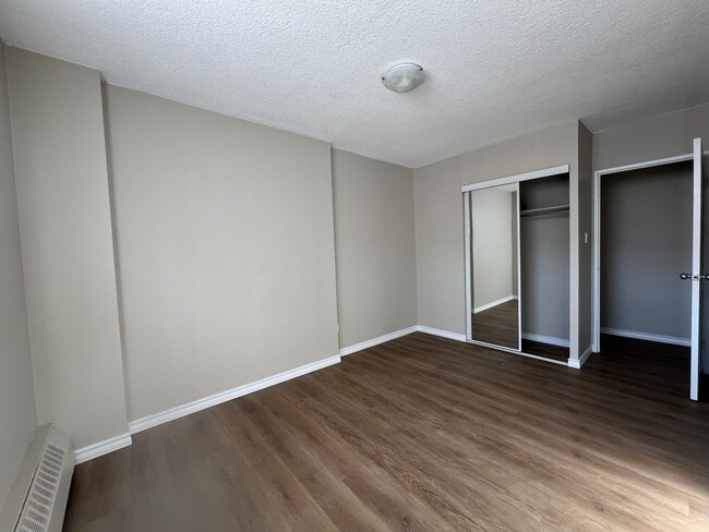 Spacious Bedroom with Built-in Closet - Newport Towers
