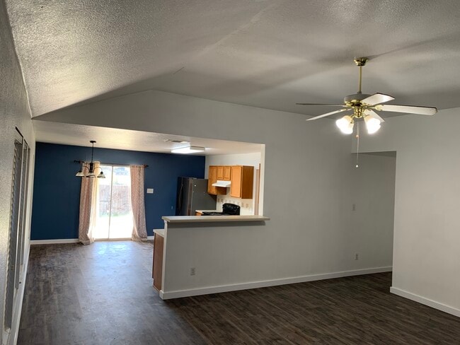 Living room open to kitchen - 1050 Brutus Dr