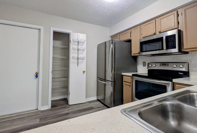 Photo - "$300 OFF MOVE-IN SPECIAL! Spacious 3-Bed, 2.5 Bath Townhouse Nestled in the Heart of East Arling...