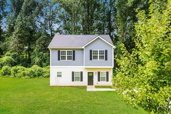 Building Photo - 604 E Texas Ave