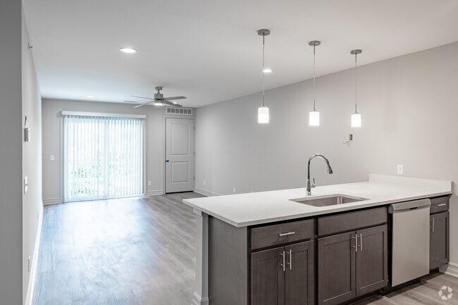 1BR, 1BA - 956SF - Living and Dining Area - Theo's Place