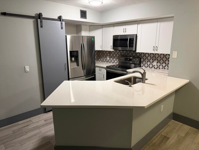 Building Photo - 4211 San Marino Blvd Unit 105