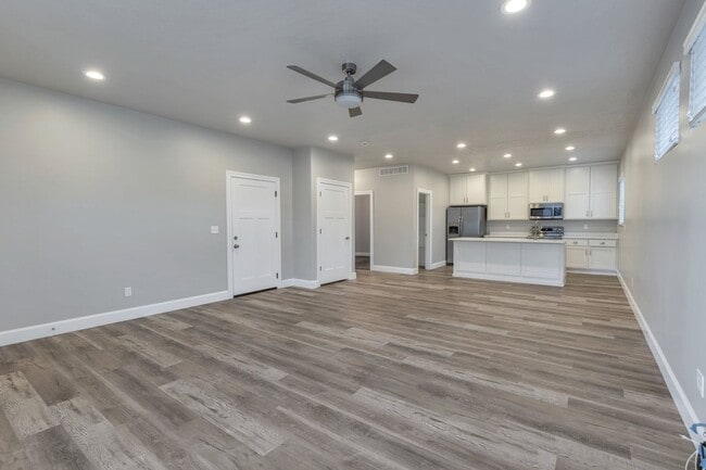 Photo - Spacious 4 Bed, 2 Bath Pet-Friendly Home with Central Air & 2-Car Garage! Available on July 6th!