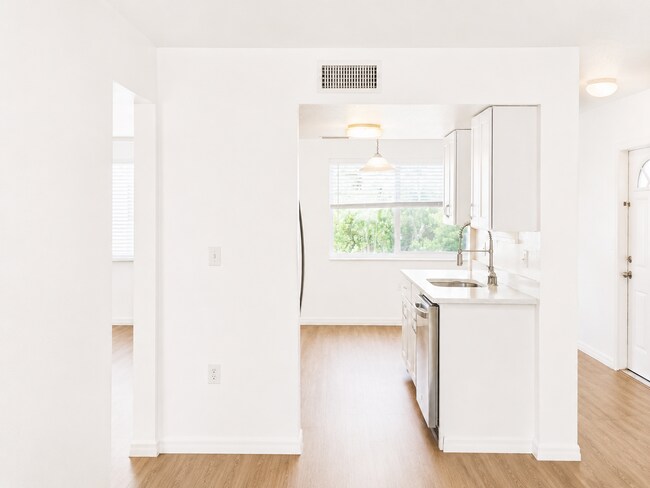 Photo - Updated 2-Bedroom Condo with Screened Lanai with water included.