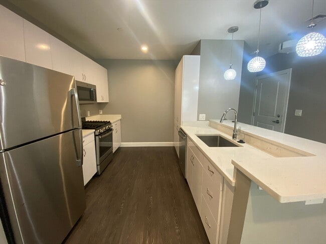 Photo - 4945 Washington St Unit 107