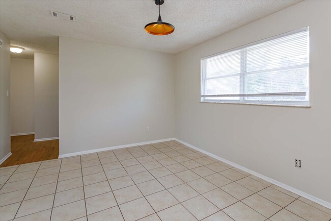 Photo - Charming 3-Bedroom Single-Family Home with Large Yard in Sanford — $1,697/month