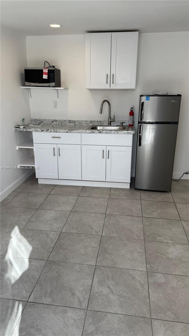 Building Photo - 12764 SW 46th Ln Unit 1