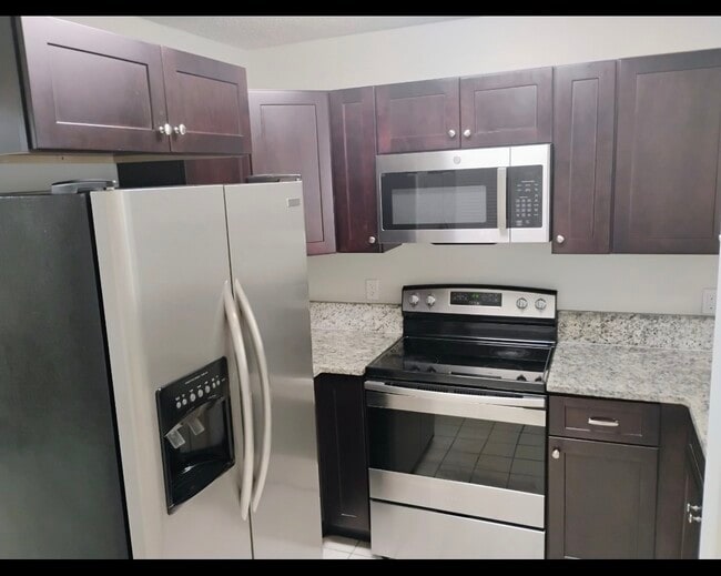 Building Photo - 5017 City St Unit 1933