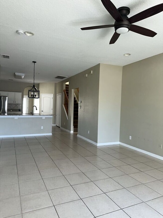 Photo - PALM COVE - 4/3 WITH ADDITIONAL DEN AND UPSTAIRS LOFT