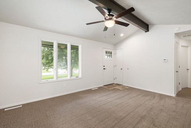Photo - Charming Updated Home with 1-Car Garage, Fenced Backyard & Modern Finishes