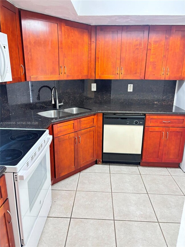 Building Photo - 7410 SW 82nd St Unit K103