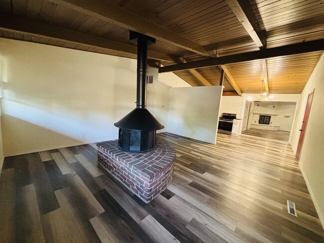 Photo - Quirky Mid-Century 3BR with High Beam Ceilings + Fenced Yard – $1,550