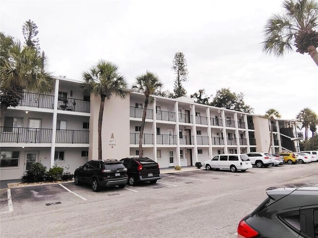 Building Photo - 5955 Palm Ln Unit A33